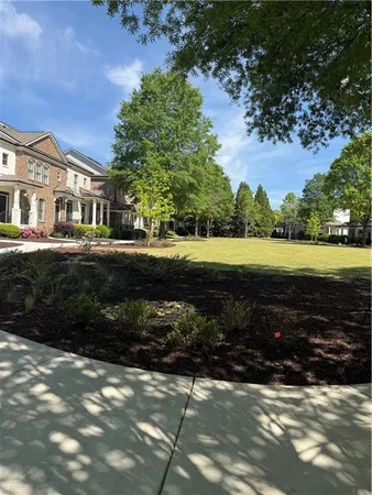 a view of a yard with an outdoor space