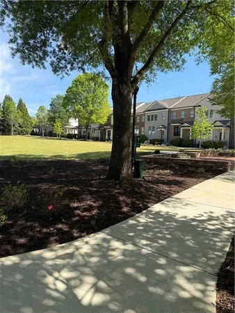a view of a yard with an outdoor space