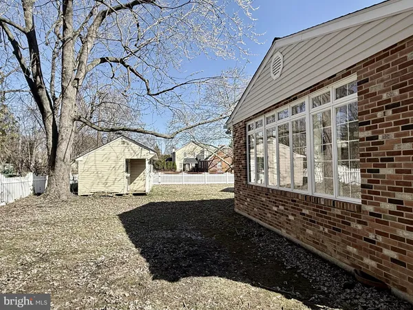 a view of a back yard of the house