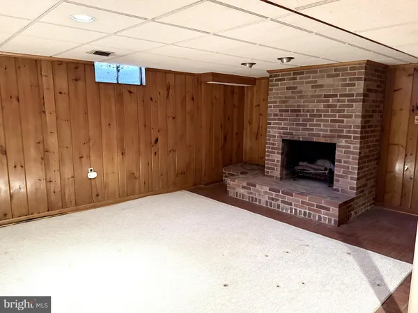 a view of a livingroom with a fireplace