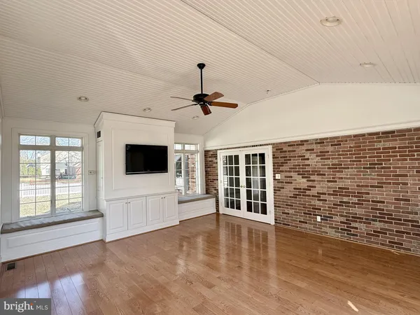 a view of livingroom with furniture wooden floor and window