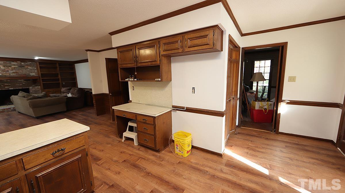 2024 Corberrie Lane Raleigh, NC 27613 - Photo 14 of 30 a living room with furniture and a wooden floor