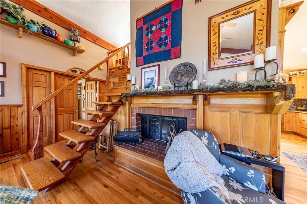 5757 Clouds Rest Mariposa, CA 95338 - Photo 24 of 68 a living room with furniture and a fireplace