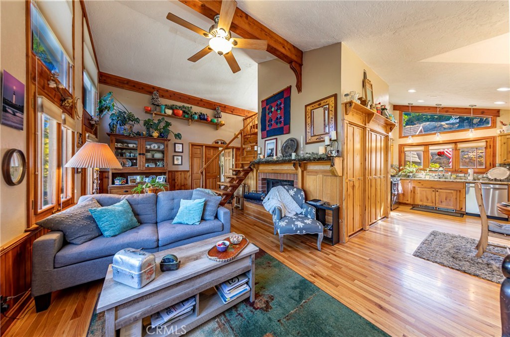 5757 Clouds Rest Mariposa, CA 95338 - Photo 26 of 68 a living room with furniture a ceiling fan and a rug