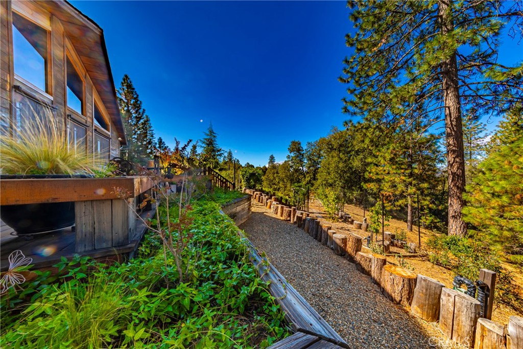 5757 Clouds Rest Mariposa, CA 95338 - Photo 3 of 68 a view of a house with a yard