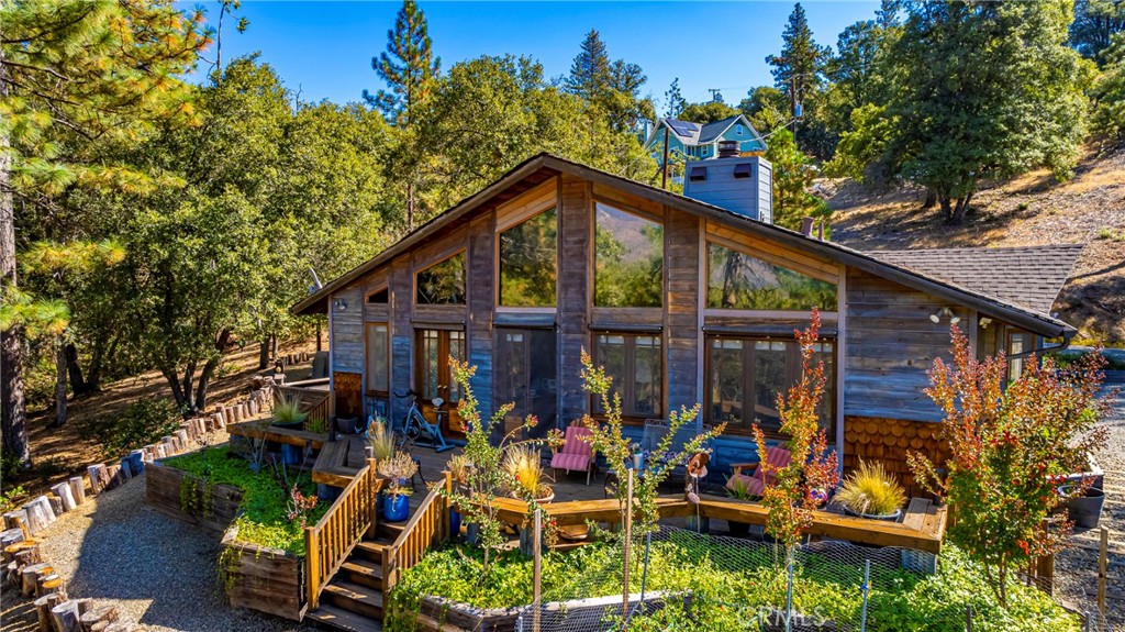 5757 Clouds Rest Mariposa, CA 95338 - Photo 41 of 68 an aerial view of a house with swimming pool garden and outdoor seating