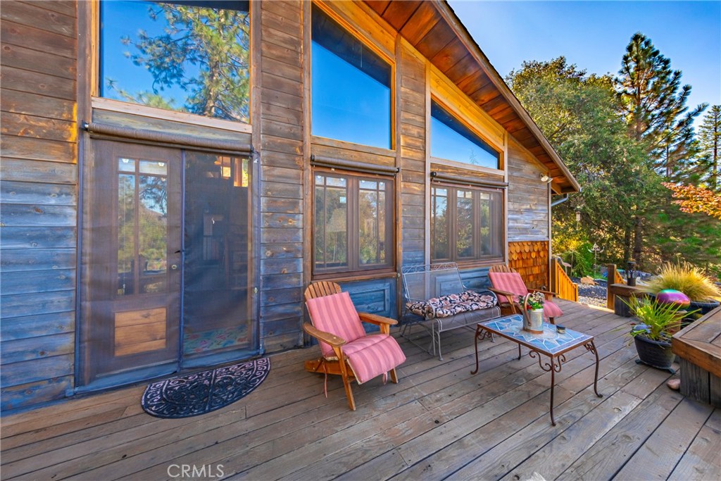 5757 Clouds Rest Mariposa, CA 95338 - Photo 44 of 68 a outdoor space with lots of furniture and wooden floor