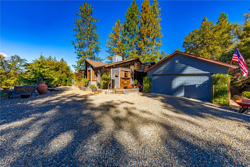 5757 Clouds Rest Mariposa, CA 95338 - Photo 48 of 68 a front view of a house with a yard