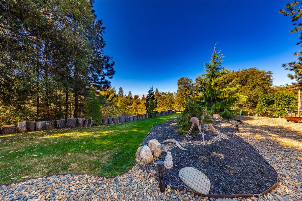 5757 Clouds Rest Mariposa, CA 95338 - Photo 49 of 68 a view of a backyard with large trees