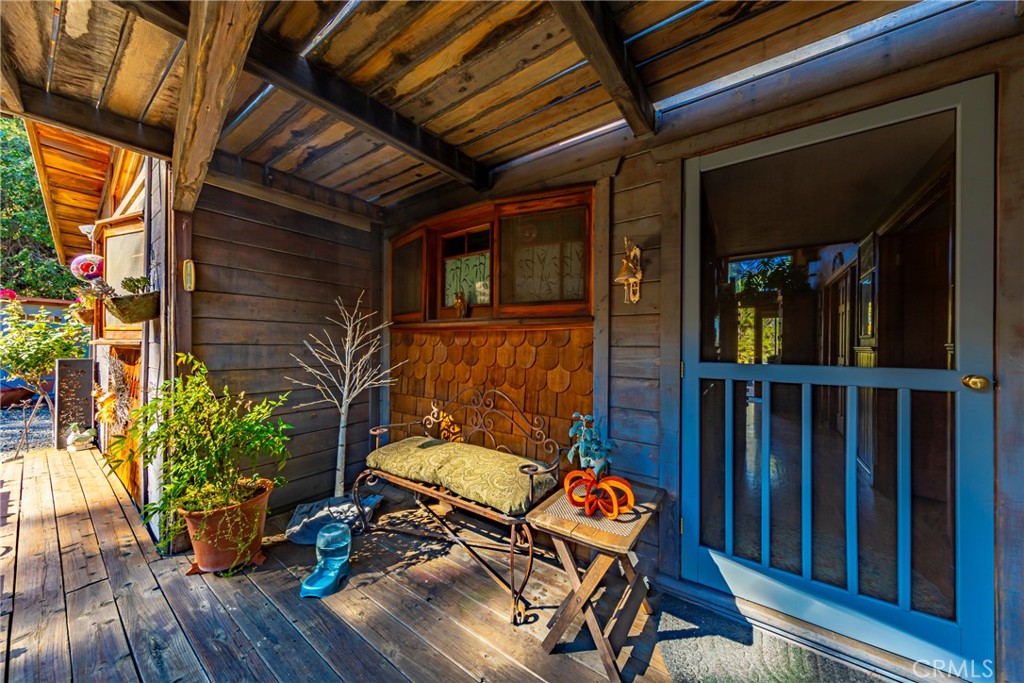 5757 Clouds Rest Mariposa, CA 95338 - Photo 5 of 68 a view of a patio with a table and chairs