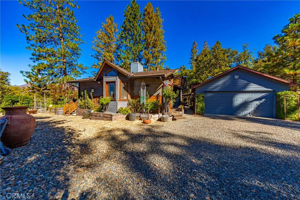 5757 Clouds Rest Mariposa, CA 95338 - Photo 54 of 68 a front view of a house with a yard