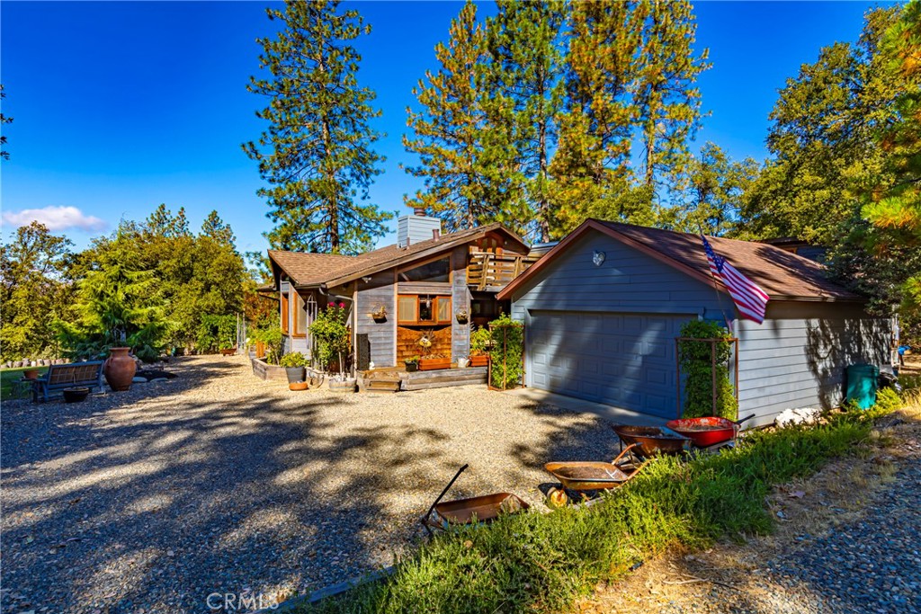 5757 Clouds Rest Mariposa, CA 95338 - Photo 56 of 68 a front view of a house with a yard