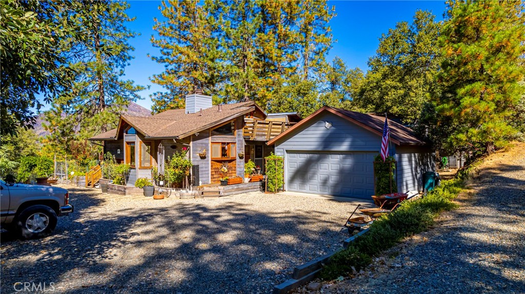 5757 Clouds Rest Mariposa, CA 95338 - Photo 58 of 68 a view of an house with backyard space and garden