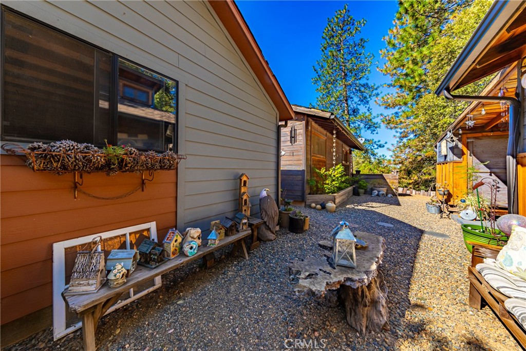 5757 Clouds Rest Mariposa, CA 95338 - Photo 61 of 68 a backyard of a house with outdoor seating