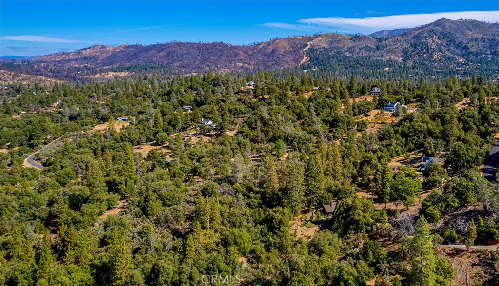 5757 Clouds Rest Mariposa, CA 95338 - Photo 64 of 68 a view of a lush green field with mountains in the background