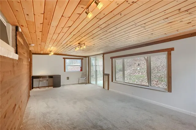 a big room with windows and closet