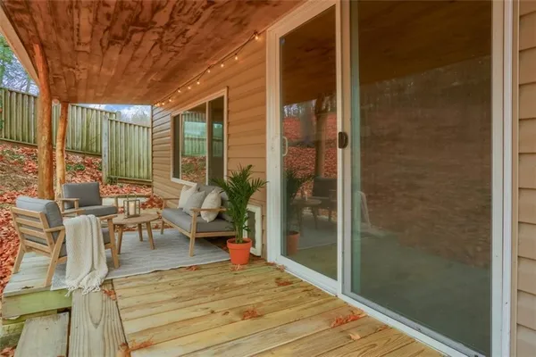 a outdoor space with lots of furniture and windows