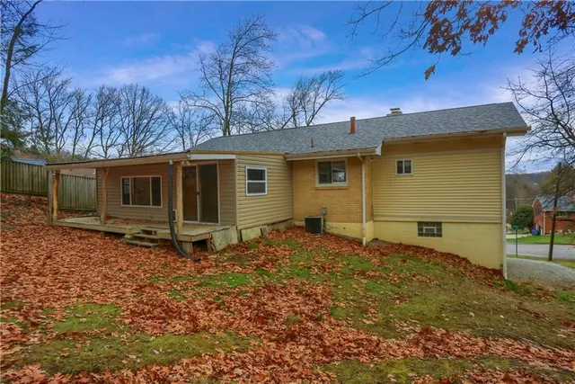 a backyard of a house with lots of green space