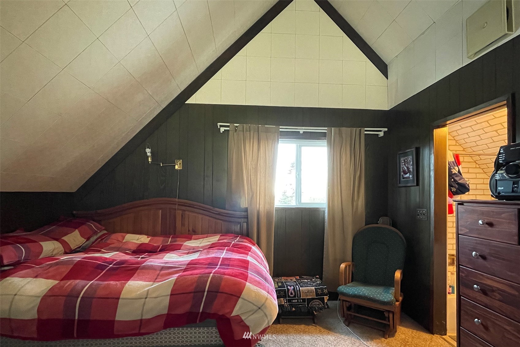 371 Lake Farm Road Port Angeles, WA 98362 - Photo 16 of 36 a bedroom with a bed and a mirror