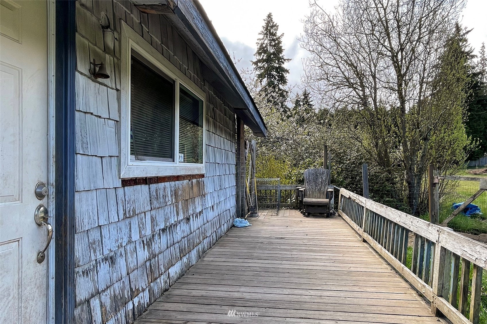 371 Lake Farm Road Port Angeles, WA 98362 - Photo 19 of 36 a view of a house with backyard and wooden deck