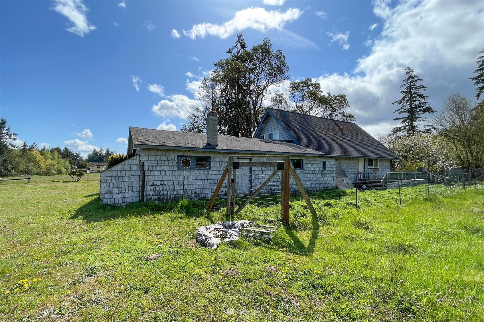 371 Lake Farm Road Port Angeles, WA 98362 - Photo 24 of 36 a view of a house with a yard balcony and sitting area