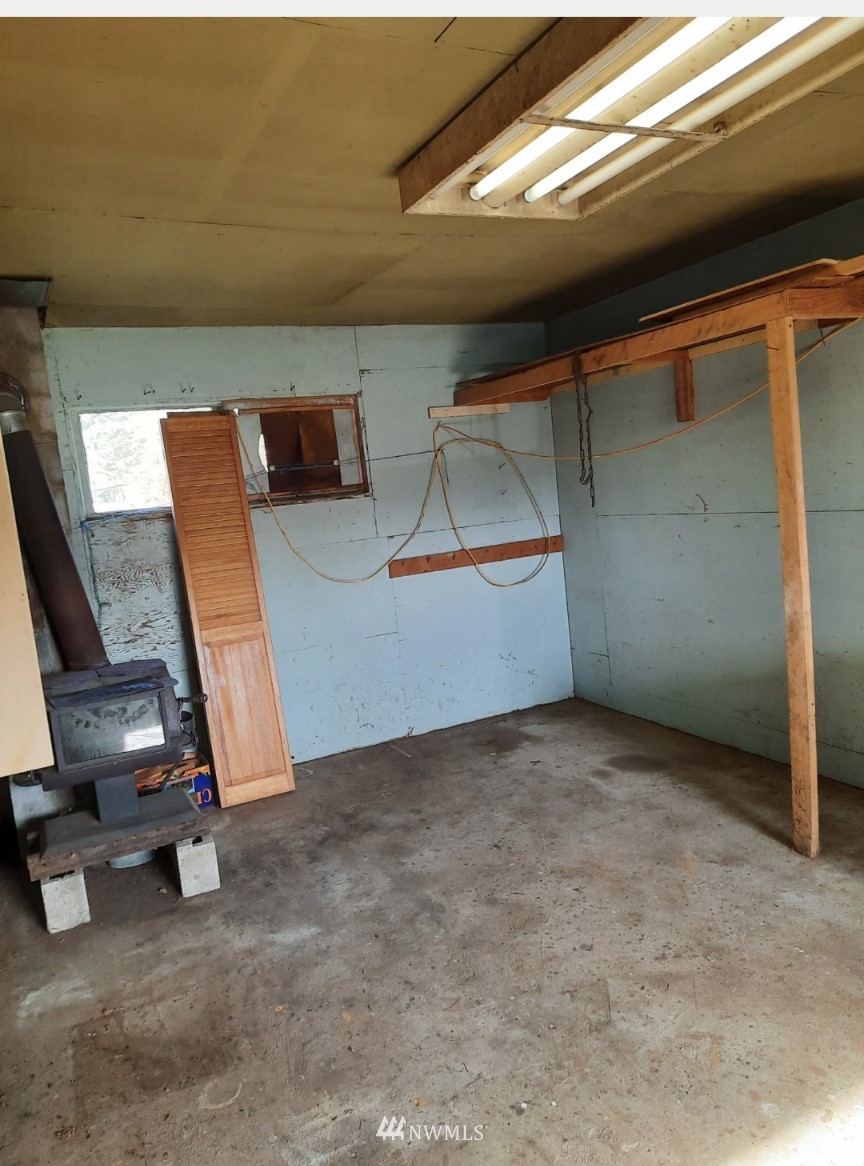 371 Lake Farm Road Port Angeles, WA 98362 - Photo 30 of 36 a view of a room with wooden floor