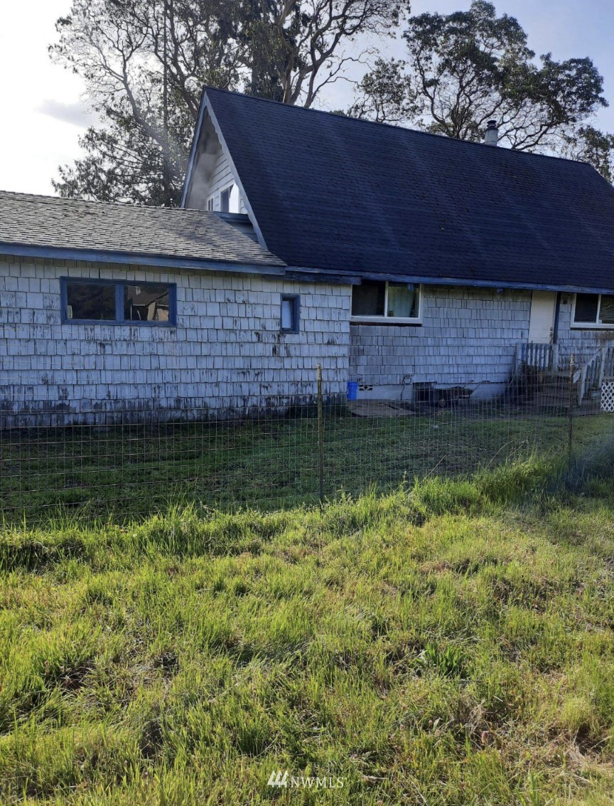 371 Lake Farm Road Port Angeles, WA 98362 - Photo 35 of 36 a front view of a house with a garden