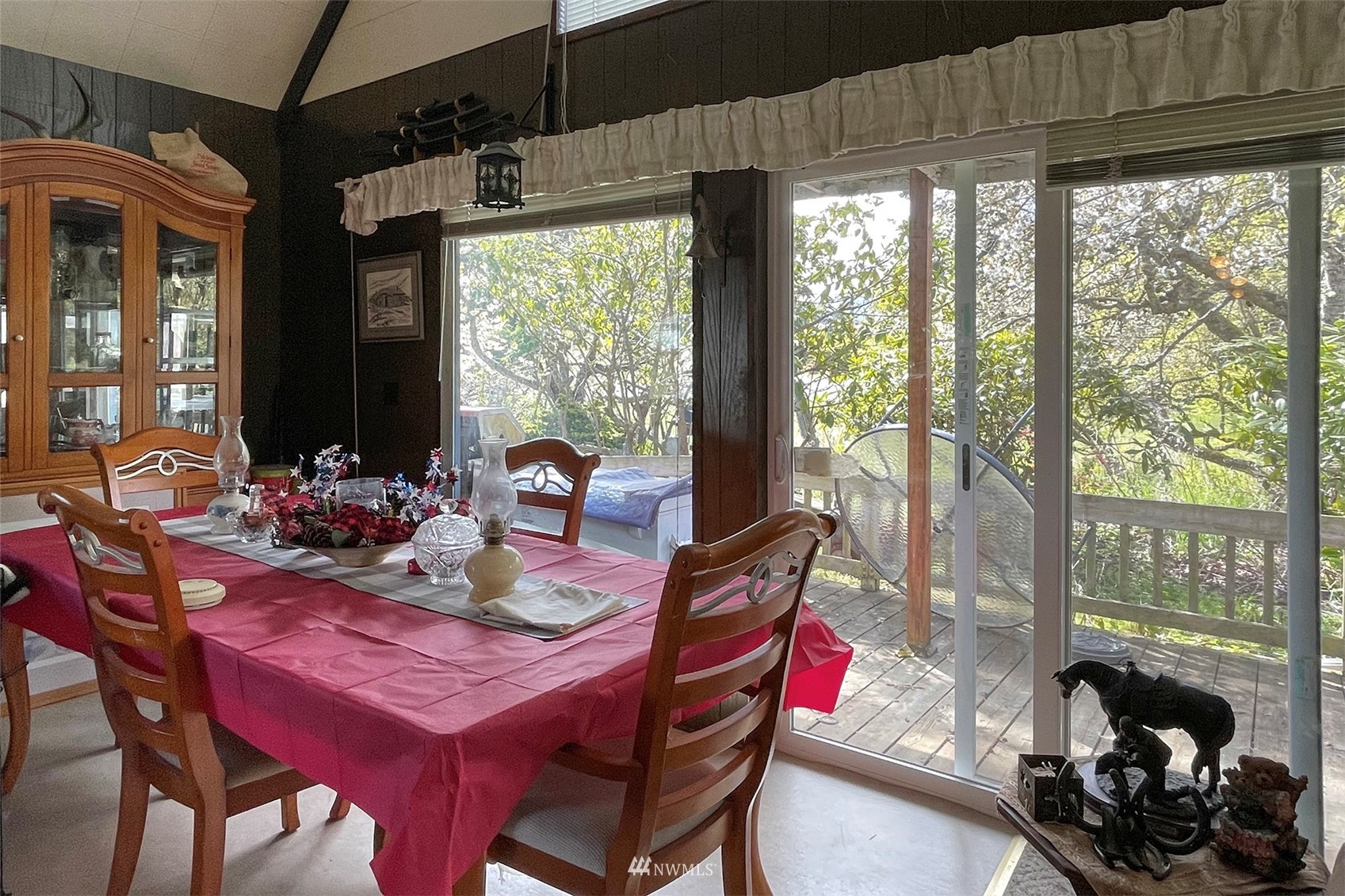 371 Lake Farm Road Port Angeles, WA 98362 - Photo 7 of 36 a view of a dining room with furniture window and outside view