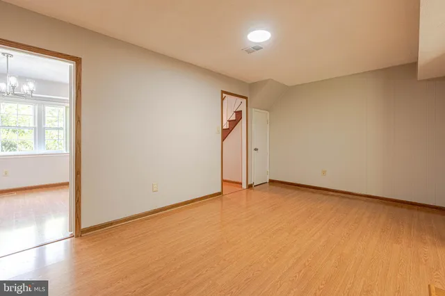 an empty room with a natural light