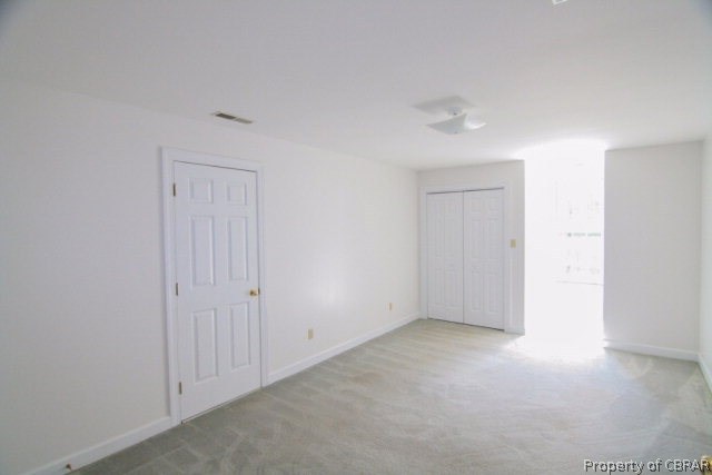 153 Laurel Ridge Road Heathsville, VA 22473 - Photo 17 of 18 Upstairs Bedroom 1 - New paint, new carpet in both bedrooms, both bedrooms feature dormer style windows.
