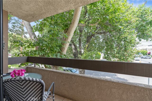 a view of balcony with a garden