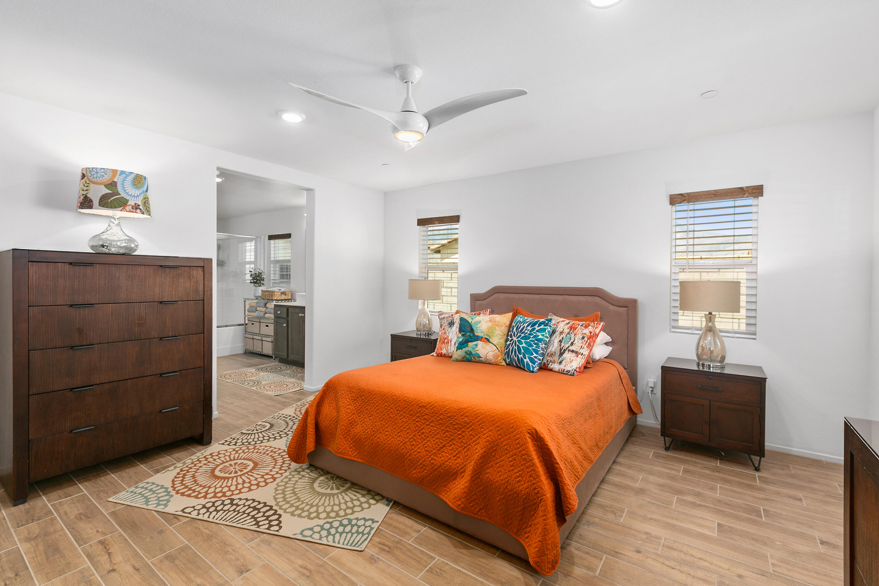 67513 Rio Largo Road Cathedral City, CA 92234 - Photo 28 of 43 a bedroom with a bed and a dresser