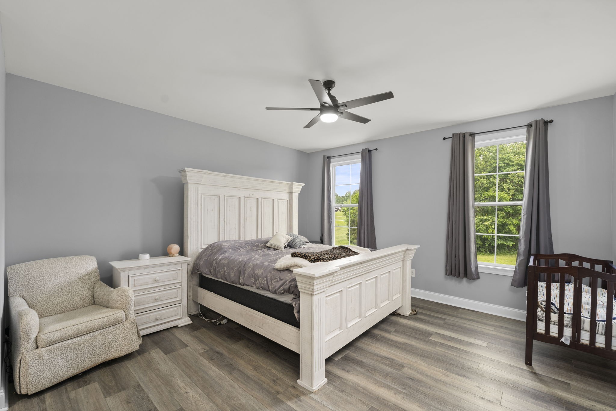 147 Roberts Road Portland, TN 37148 - Photo 14 of 30 a bedroom with a bed couch and a window