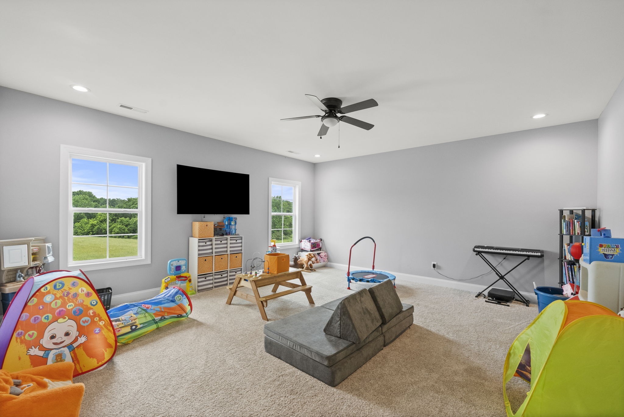 147 Roberts Road Portland, TN 37148 - Photo 20 of 30 a living room with furniture and a flat screen tv