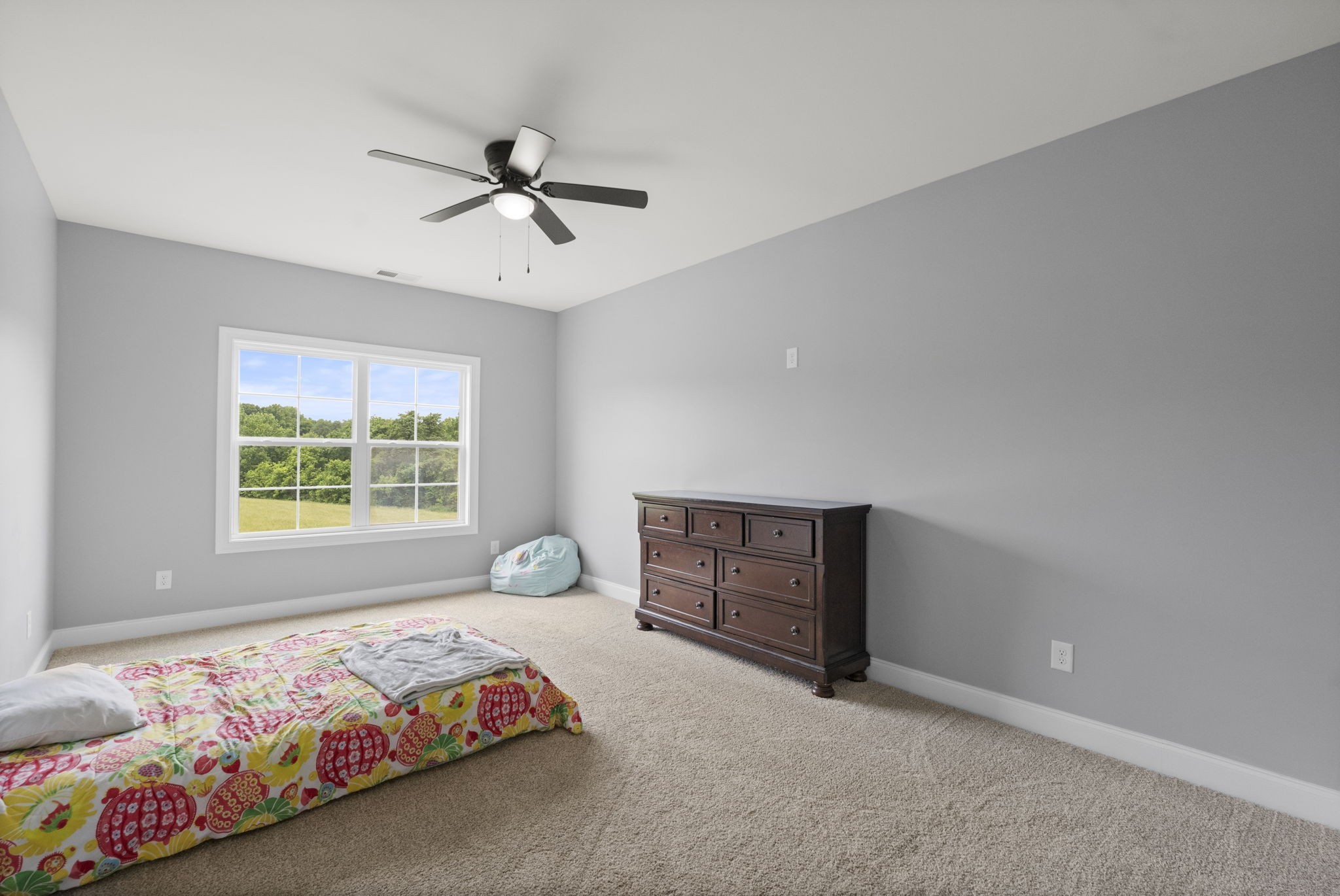 147 Roberts Road Portland, TN 37148 - Photo 23 of 30 a bedroom with a bed and a window