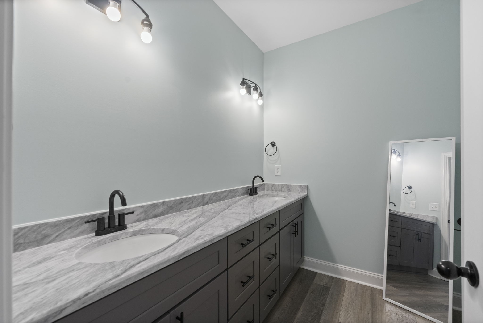 147 Roberts Road Portland, TN 37148 - Photo 24 of 30 a bathroom with a sink and a mirror