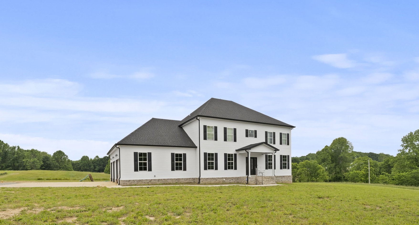 147 Roberts Road Portland, TN 37148 - Photo 28 of 30 a front view of a house with a yard