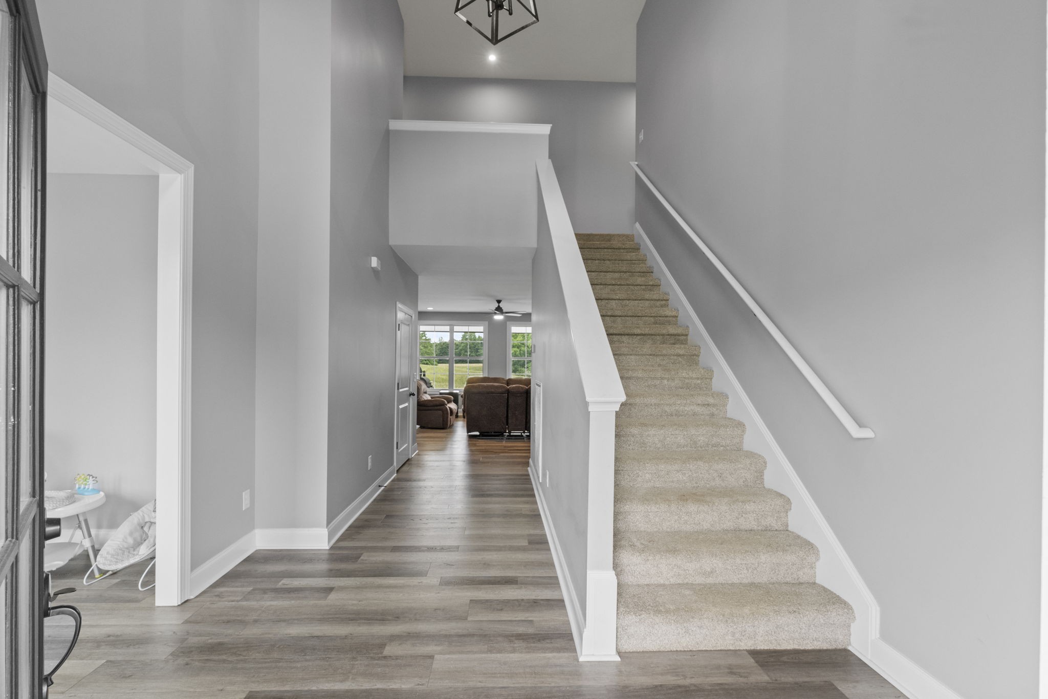 147 Roberts Road Portland, TN 37148 - Photo 5 of 30 a view of entryway and hall with wooden floor