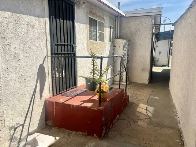 a front view of a house with a patio