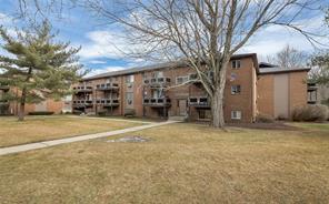 33 Tanager Road, Unit A Monroe, NY 10950 - Photo 1 of 1 a view of a house with a yard and garage
