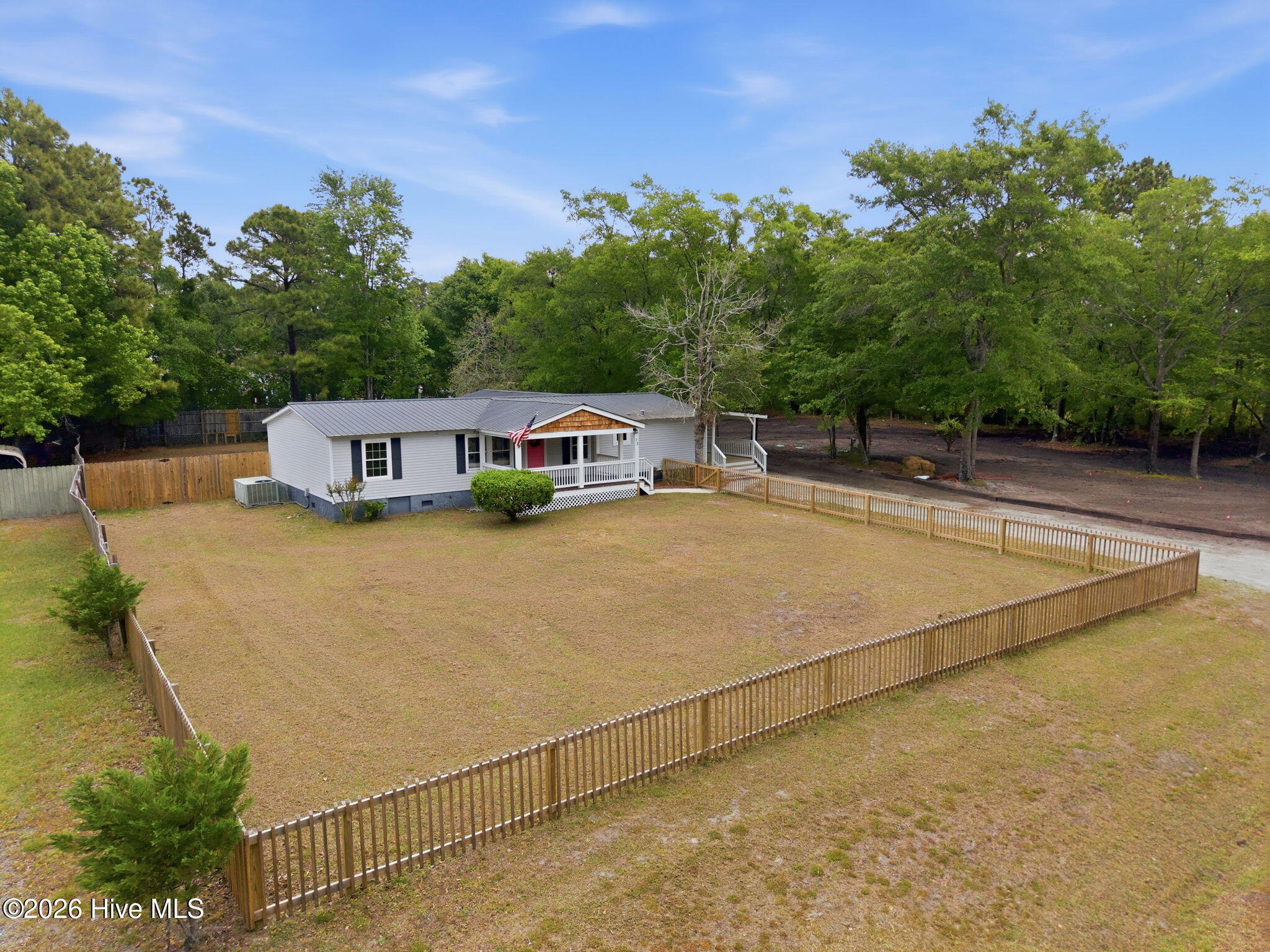 73 J E Batson Road Hampstead, NC 28443 - Photo 1 of 42 14-web-or-mls-DJI_20260501093908_0692_D