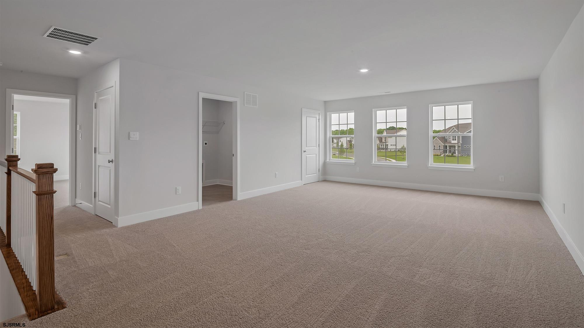 12 Henry Road Marmora, NJ 08223 - Photo 10 of 16 an empty room with windows