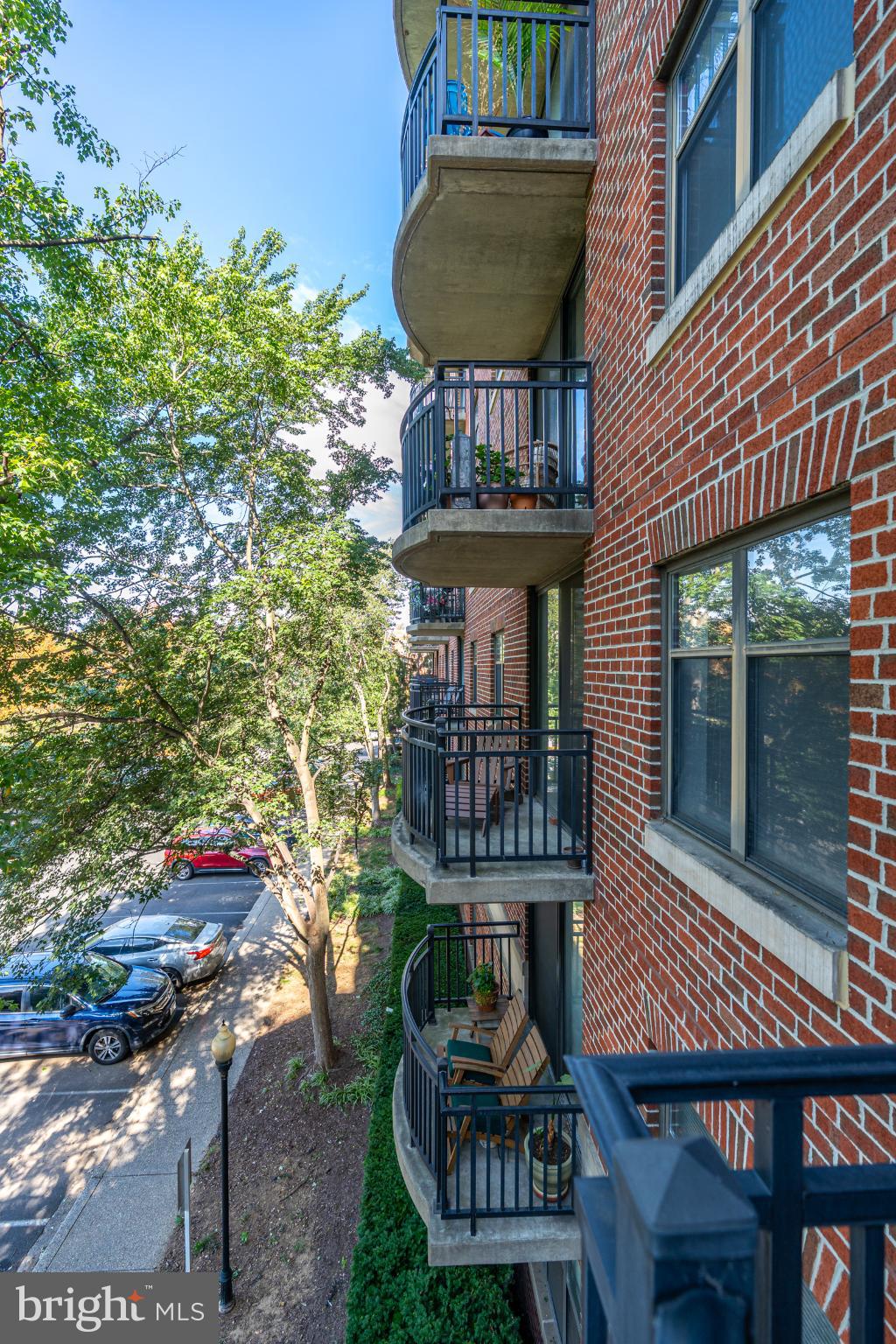 3401 38th Street Northwest, Unit 316 Washington, DC 20016 - Photo 29 of 34 Charming brick facade with inviting balconies.