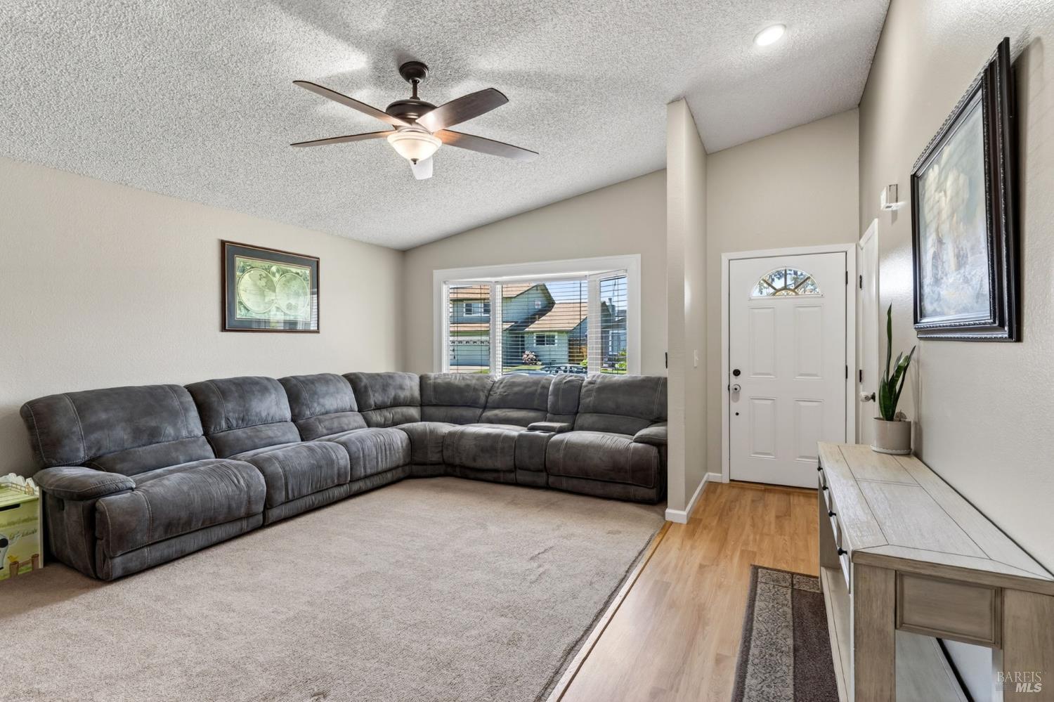 4526 Hillview Court Rohnert Park, CA 94928 - Photo 3 of 28 a living room with furniture and a large window