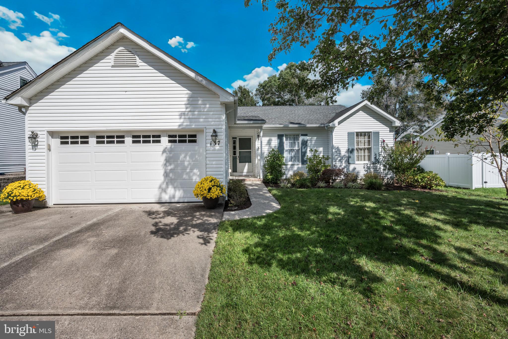 137 Skipper Road Manahawkin, NJ 08050 - Photo 1 of 33 a view of a house with backyard