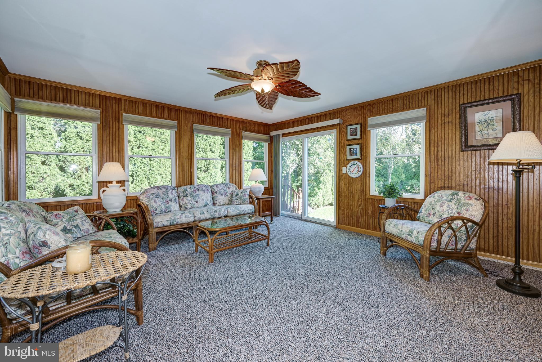 137 Skipper Road Manahawkin, NJ 08050 - Photo 17 of 33 a living room with furniture and a large window