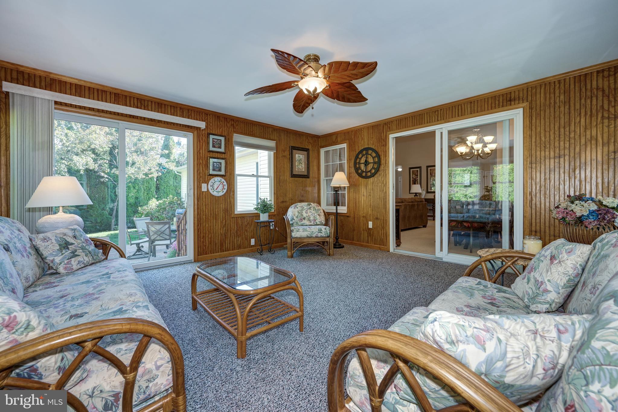 137 Skipper Road Manahawkin, NJ 08050 - Photo 19 of 33 a living room with furniture and a large window
