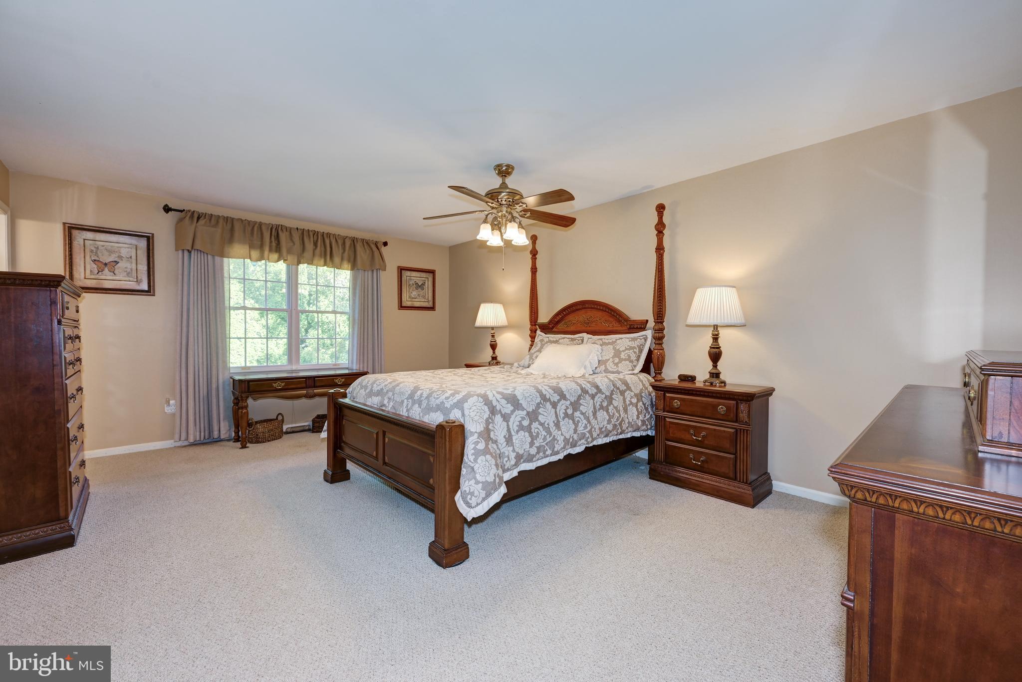 137 Skipper Road Manahawkin, NJ 08050 - Photo 21 of 33 a bedroom with a bed dresser and a window