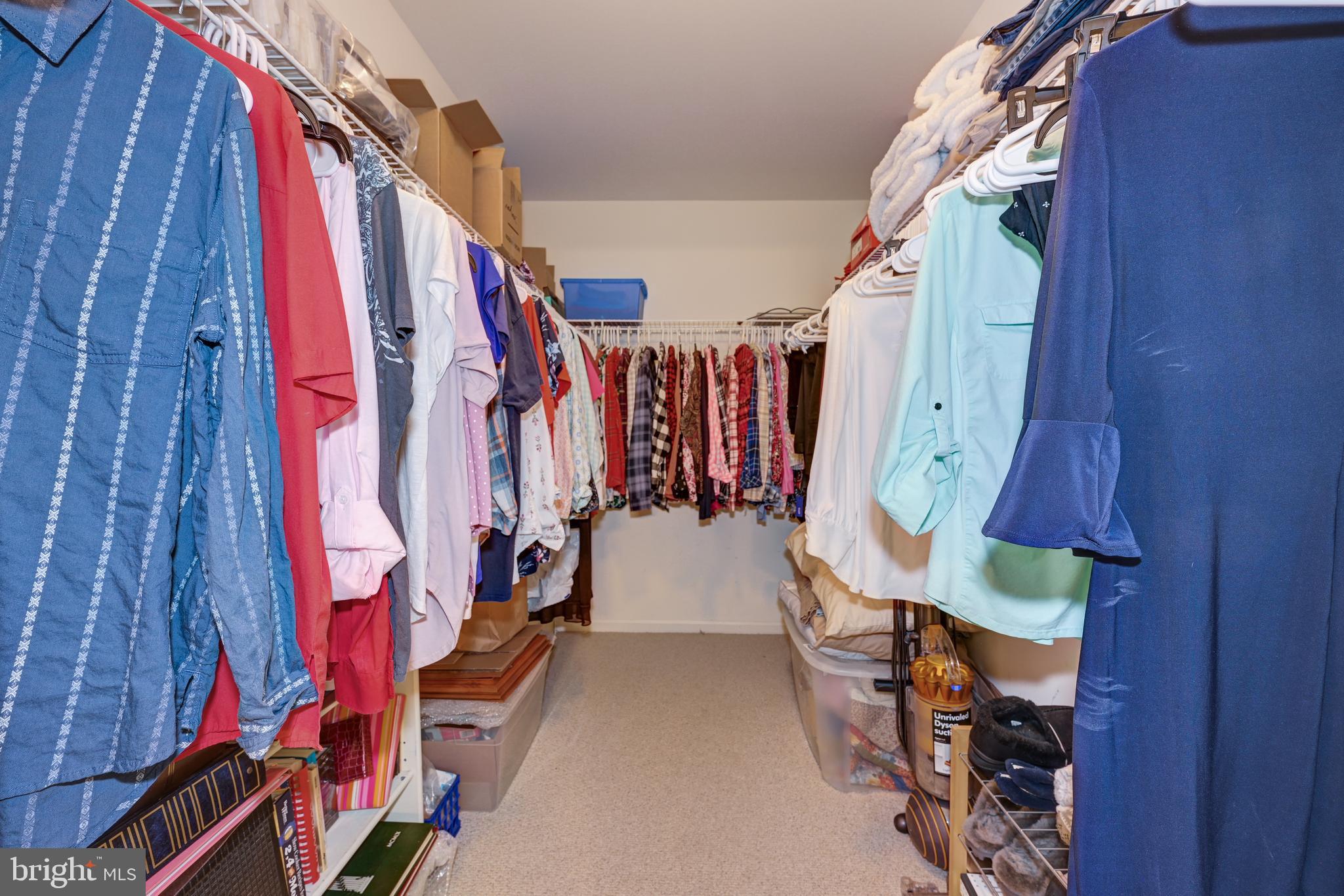 137 Skipper Road Manahawkin, NJ 08050 - Photo 23 of 33 a view of walk in closet with clothes