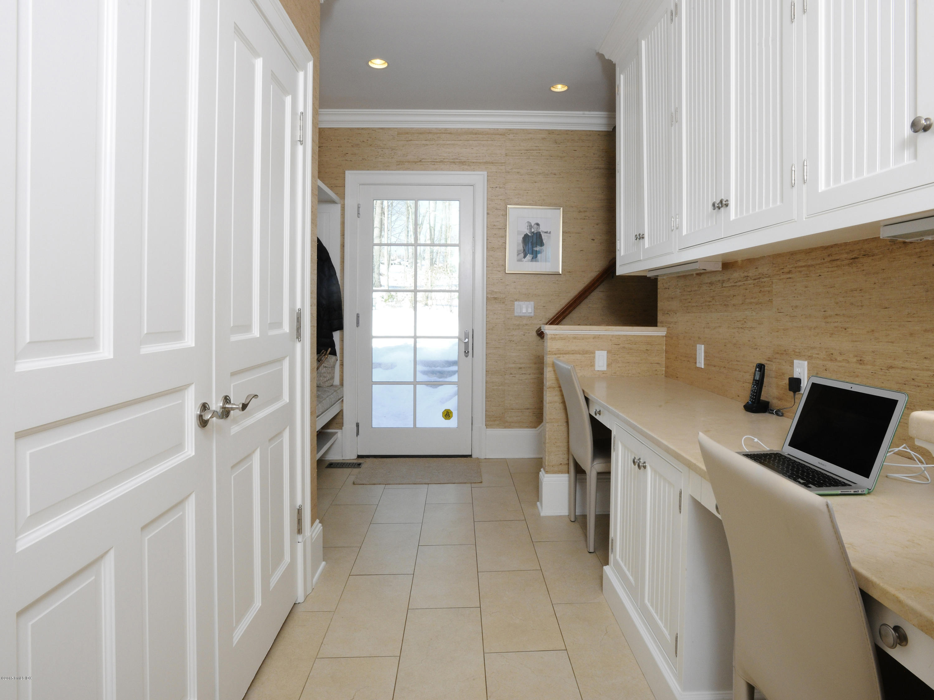 58 Brookridge Drive Greenwich, CT 06830 - Photo 12 of 18 a kitchen with a sink and cabinets